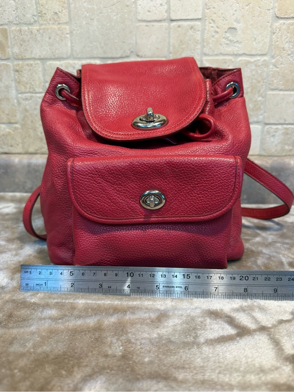 Coach Mini Red Pebble Leather Drawstring Backpack with Front Pocket